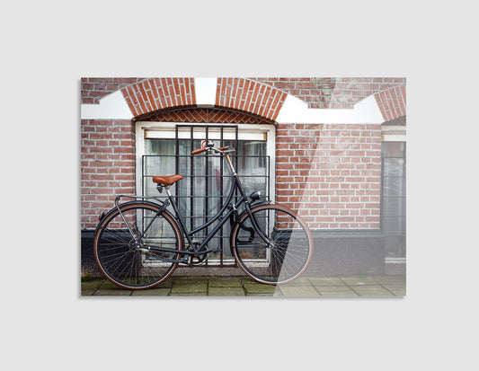 BICICLETA EN PARED DE LADRILLOS
